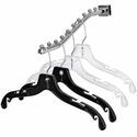 Set of black and clear hangers on a white background