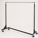 Commercial-grade Z-shaped metal clothes rack with wheels on a neutral background