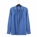 Blue shirt on a hanger against a white background