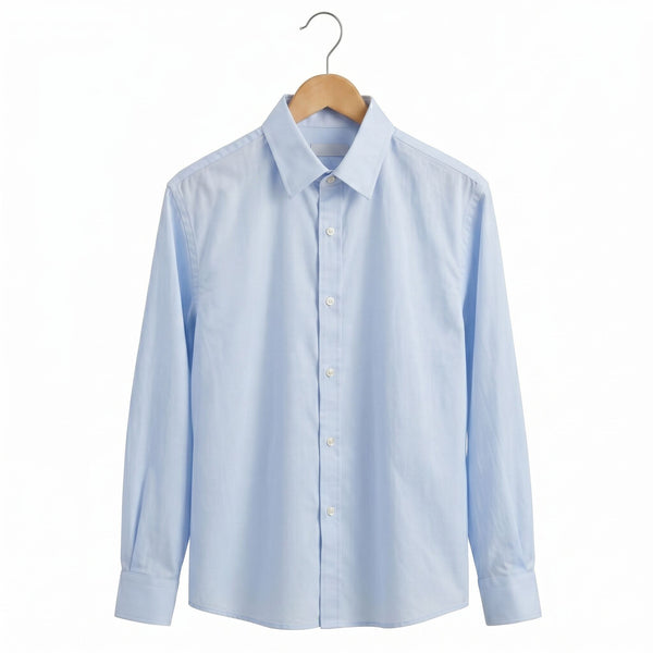Light blue dress shirt on a wooden hanger against a white background