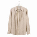 Beige shirt on a hanger against a white background