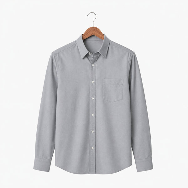 Gray button-up shirt on a wooden hanger against a white background