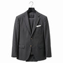 Gray blazer on a hanger against a white background
