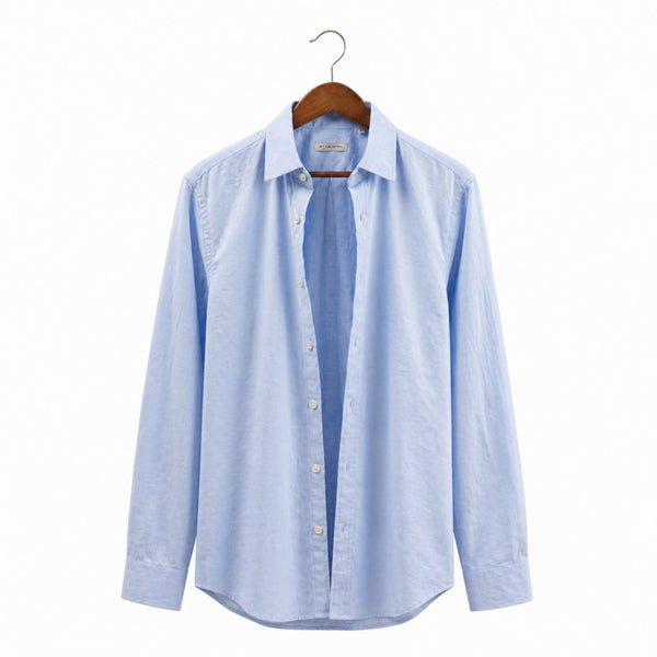 Light blue striped shirt on a hanger against a white background