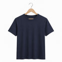 Navy blue t-shirt on a wooden hanger against a white background