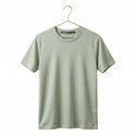 green short-sleeve shirt on a gold colour metal hanger against a white background