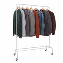 Clothing rack with various jackets and shirts on a white background