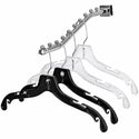Set of black and clear hangers on a white background