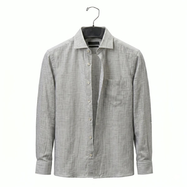 Gray shirt on a hanger against a white background
