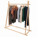 Heavy Duty Ash Wood clothing rack with various garments on a white background